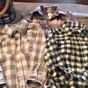 Three boys button down flannel shirts